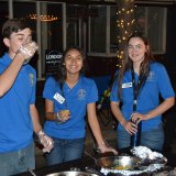 Interact students help with the chores Saturday night.